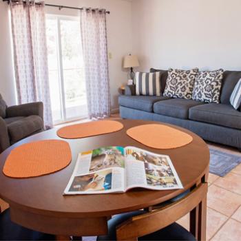 Comfortable living area with a couch and dining table