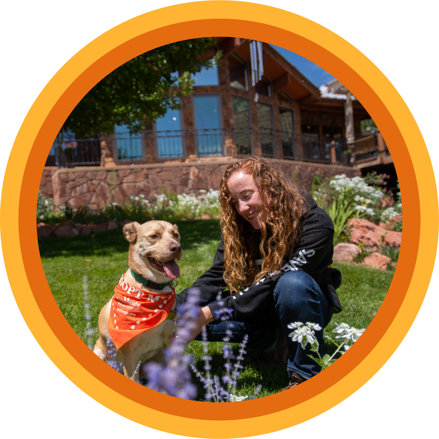 Woman and dog in front of Best Friends Welcome Center